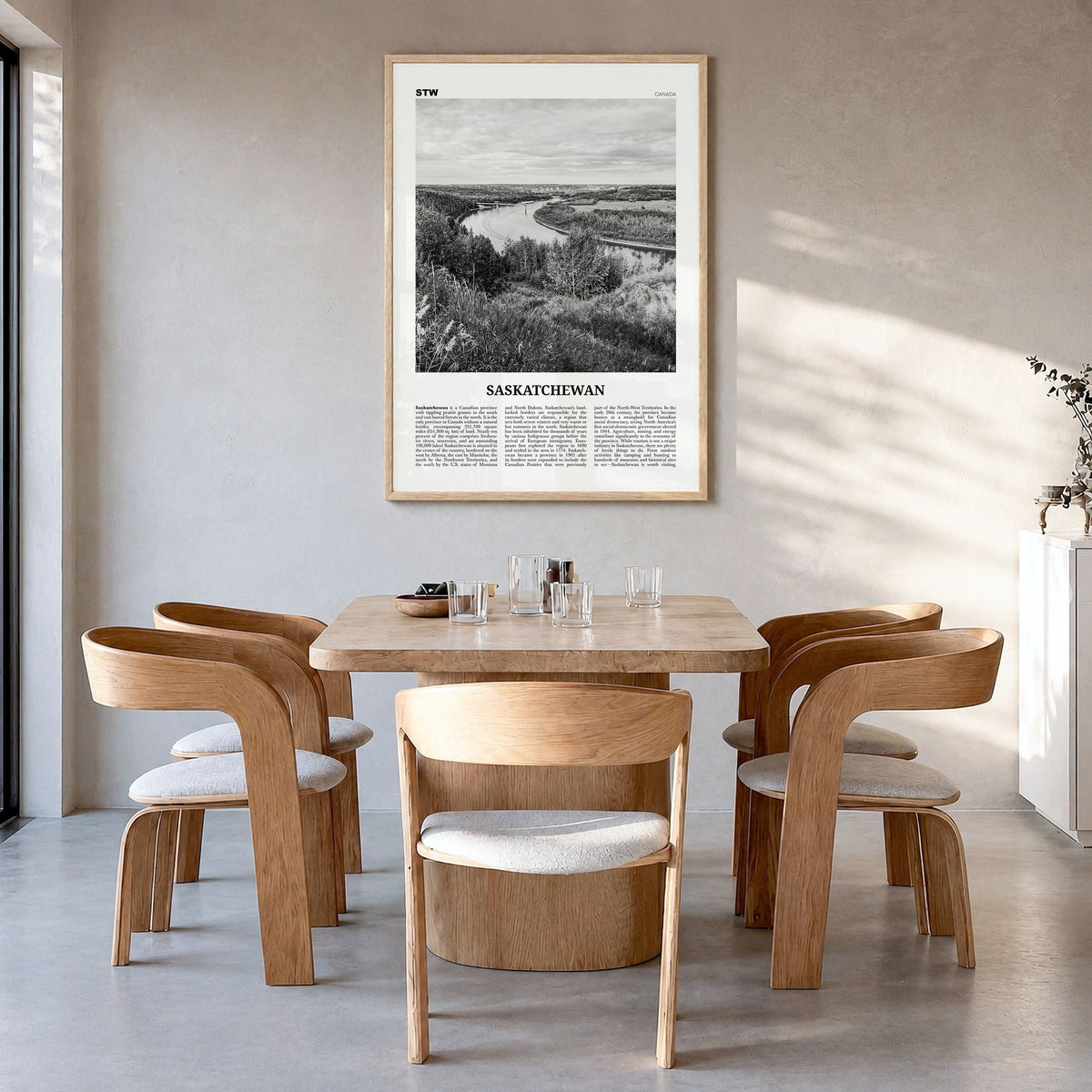 Saskatchewan Newspaper Poster in a natural wood frame, hanging in a dining room