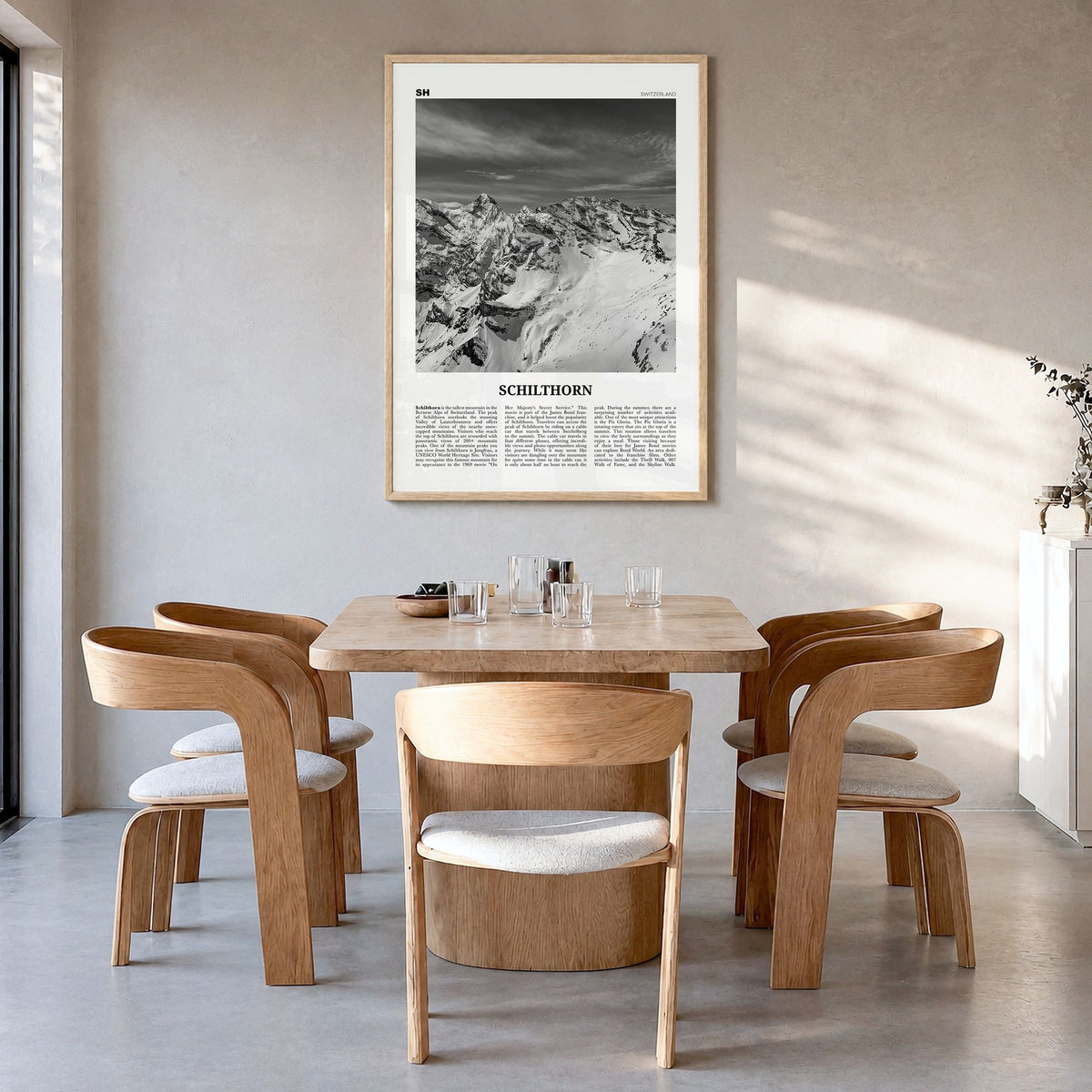 Schilthorn Newspaper Poster in a natural wood frame, hanging in a dining room
