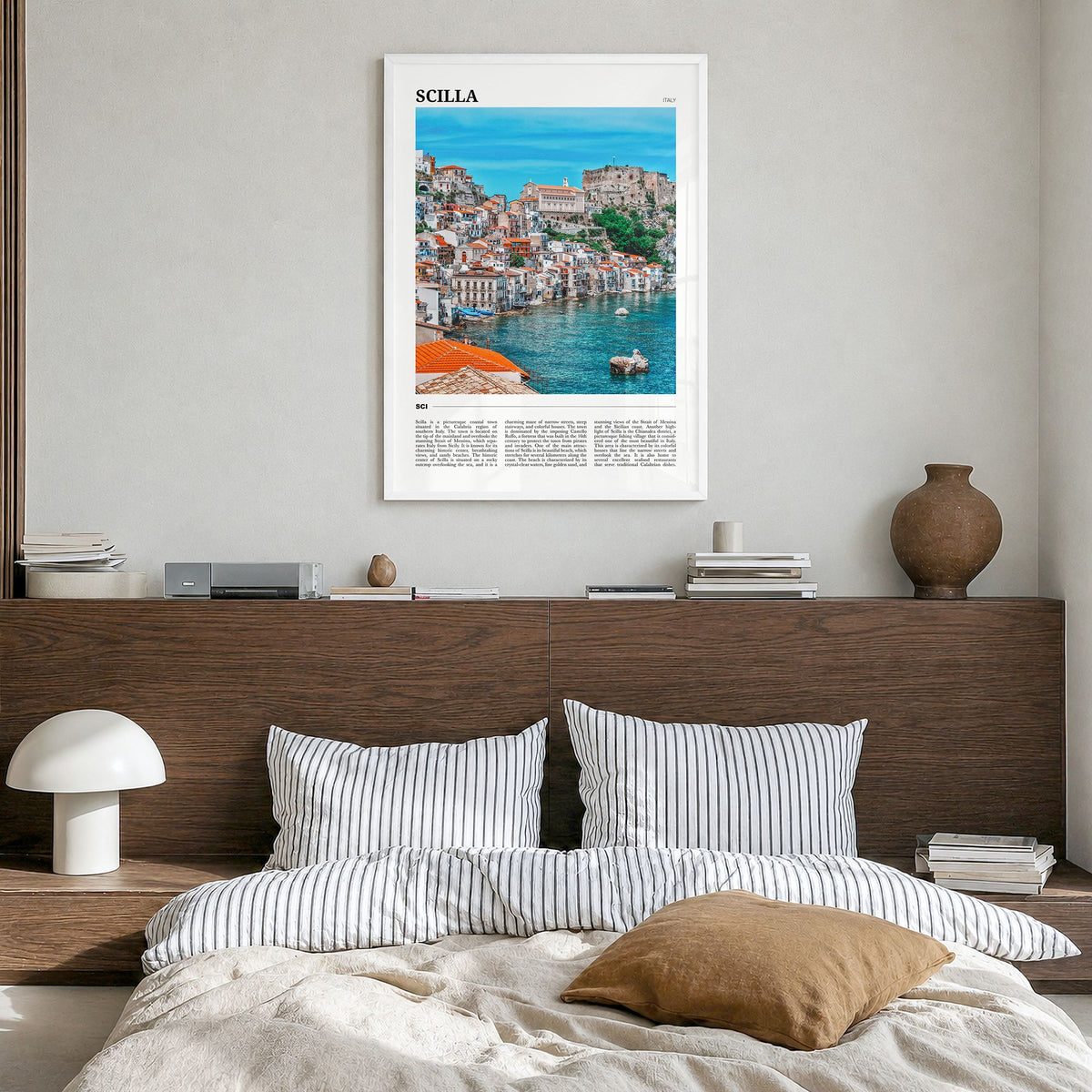 Scilla Travel Poster in a white wood frame, hanging in a bedroom