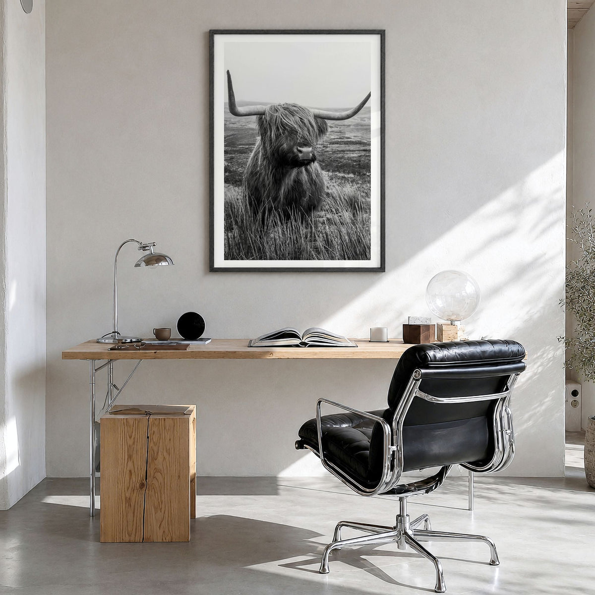 Highland Cow Photo No 1 Poster in a black wood frame, hanging in a bright home office, white border