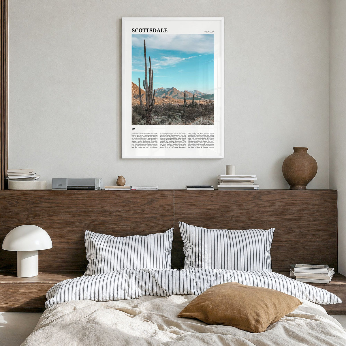 Scottsdale Travel Poster in a white wood frame, hanging in a bedroom