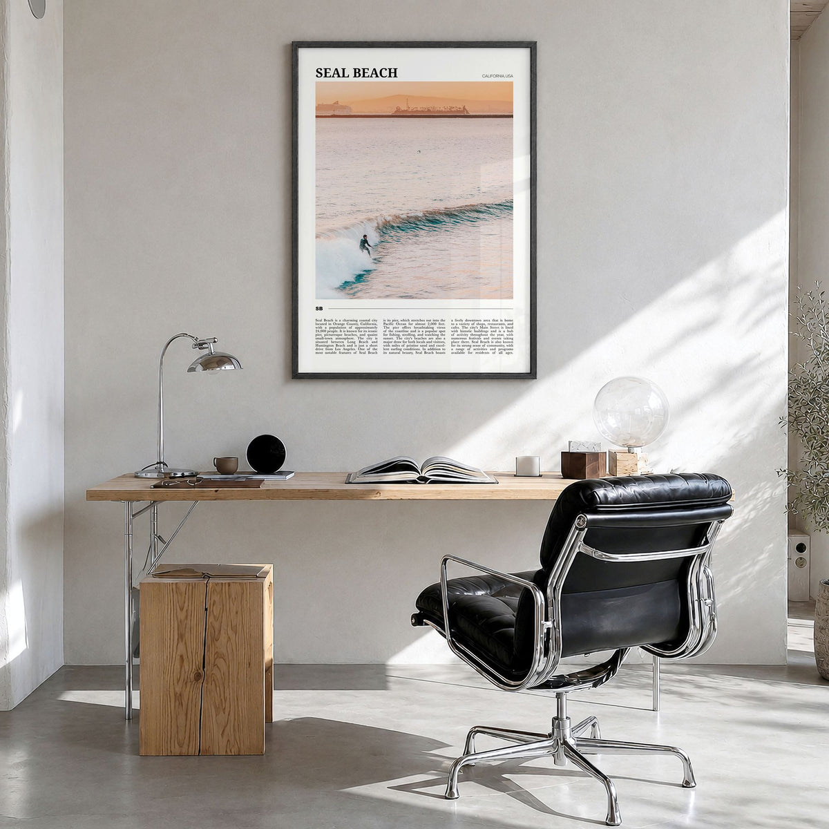 Seal Beach Travel No 1 Poster in a black wood frame, hanging in a bright home office