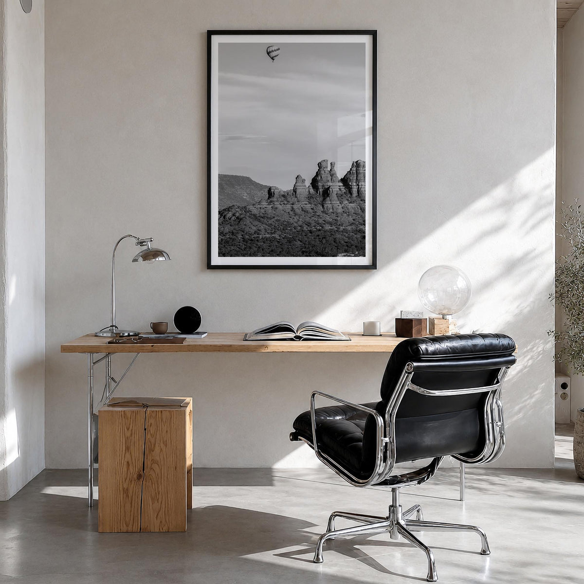 Sedona black & white photo poster of Arizona, USA – vertical wall art in black wood frame with white border, hanging on wall