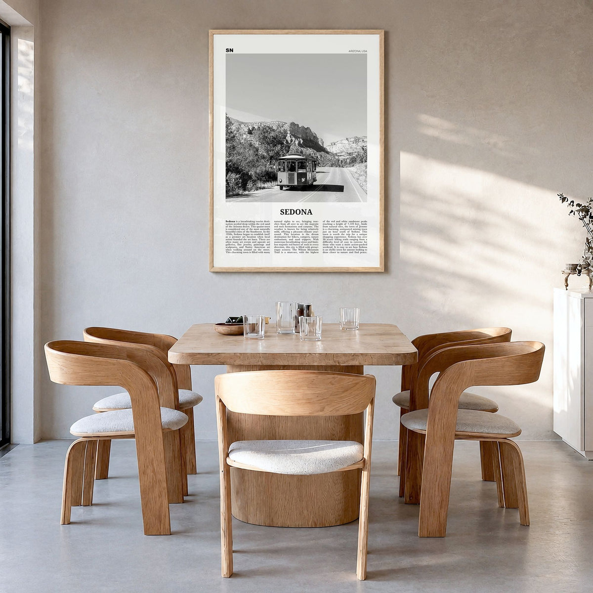 Sedona Newspaper Poster in a natural wood frame, hanging in a dining room