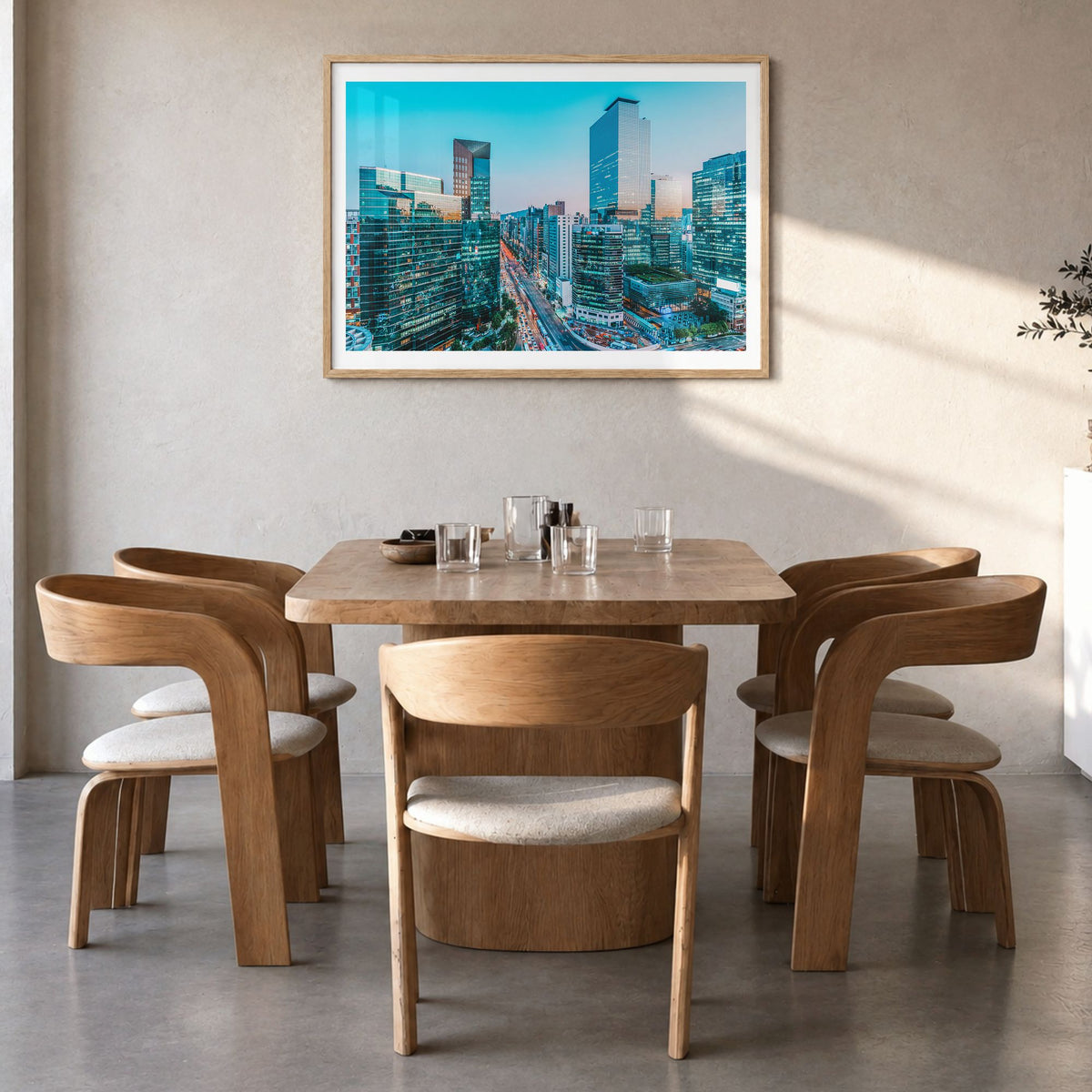 Seoul Photo Poster in a natural wood frame, hanging in a dining room, white border