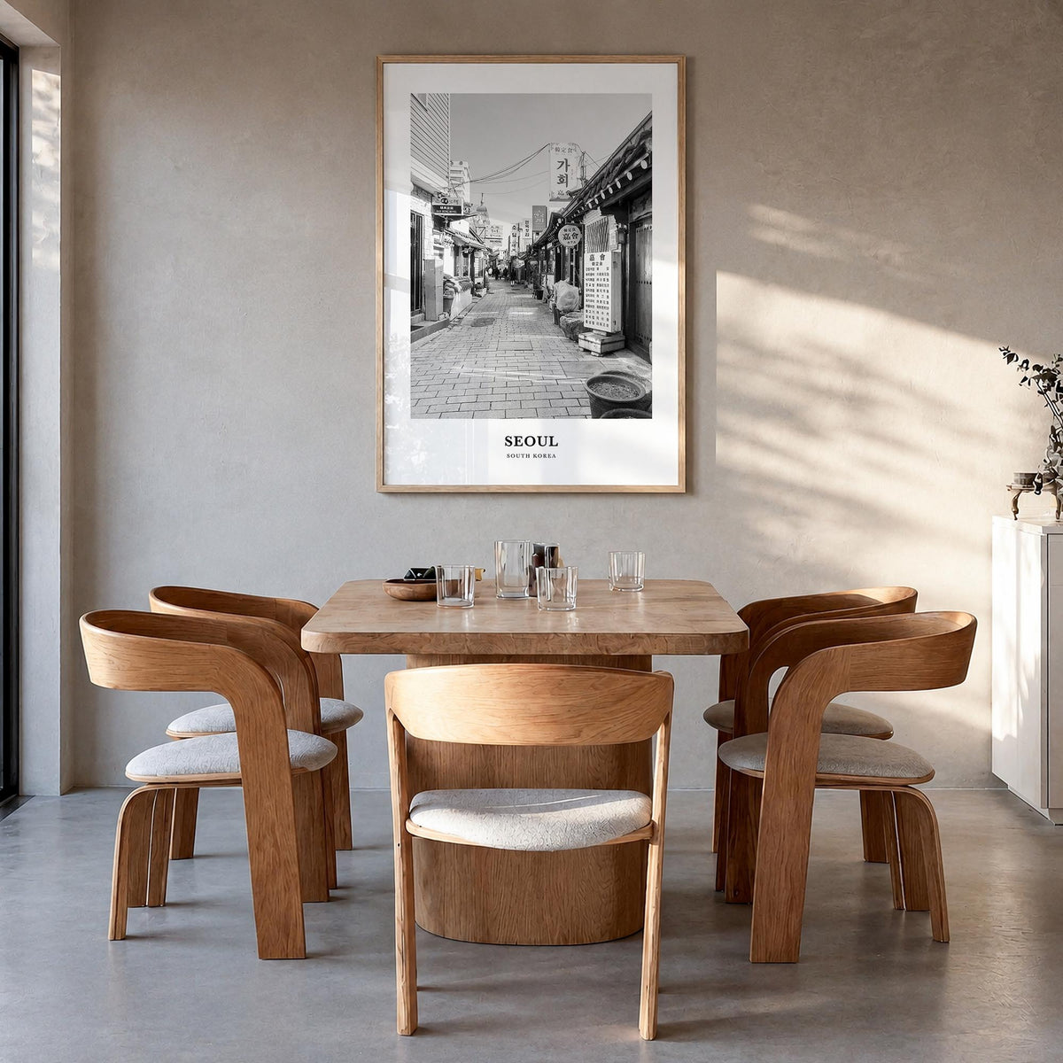 Seoul no. 2 black & white classic poster of South Korea – vertical wall art in natural wood frame, hanging on wall