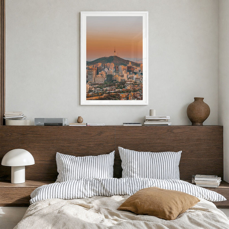 Seoul Photo No 1 Poster in a white wood frame, hanging in a bedroom, white border
