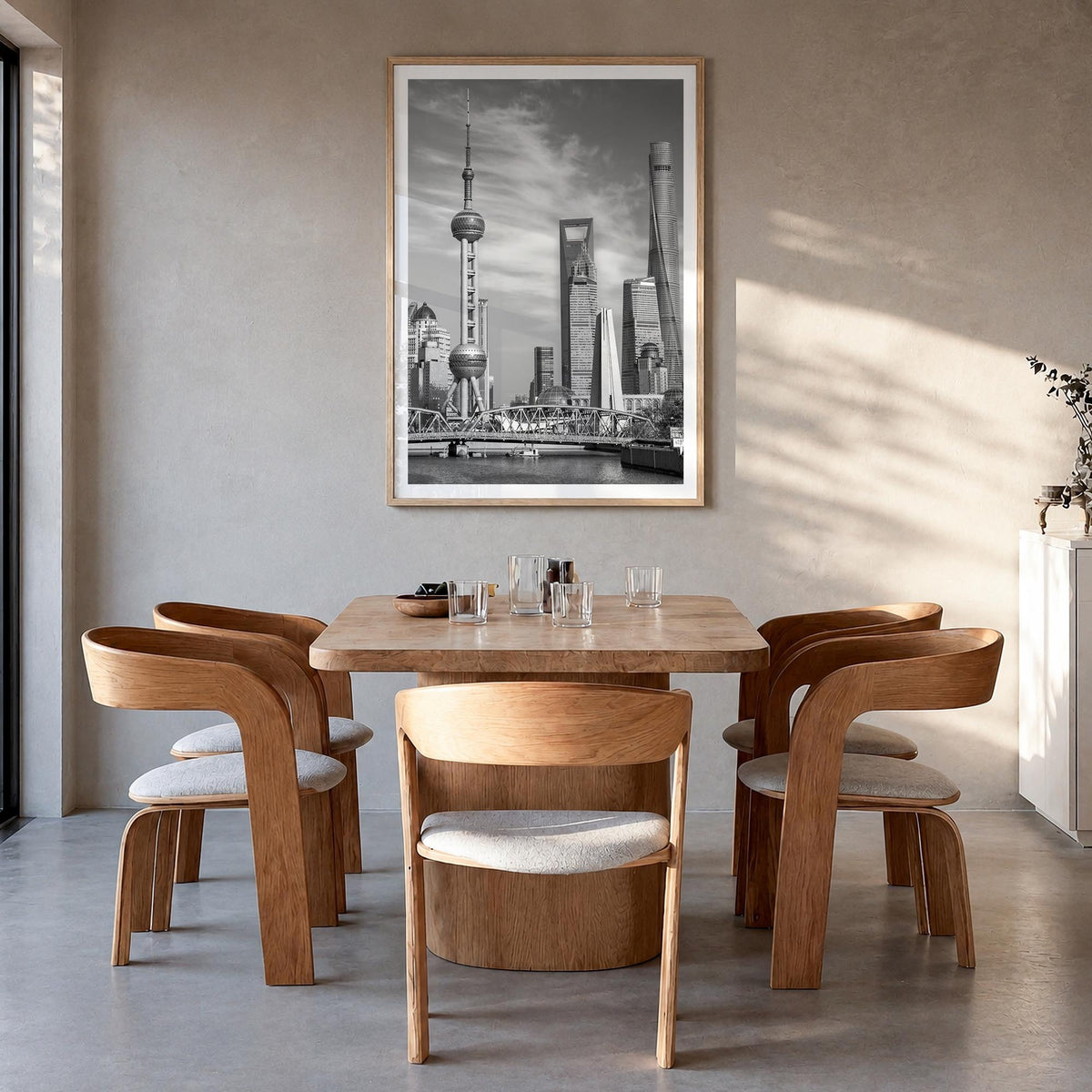 Shanghai black & white photo poster of China – vertical wall art in natural wood frame with white border, hanging on wall