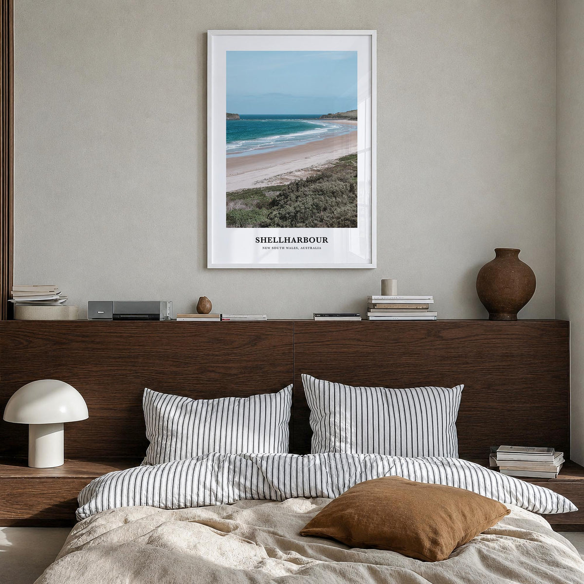 Shellharbour colorful classic poster of Australia – vertical wall art in white wood frame, hanging on wall