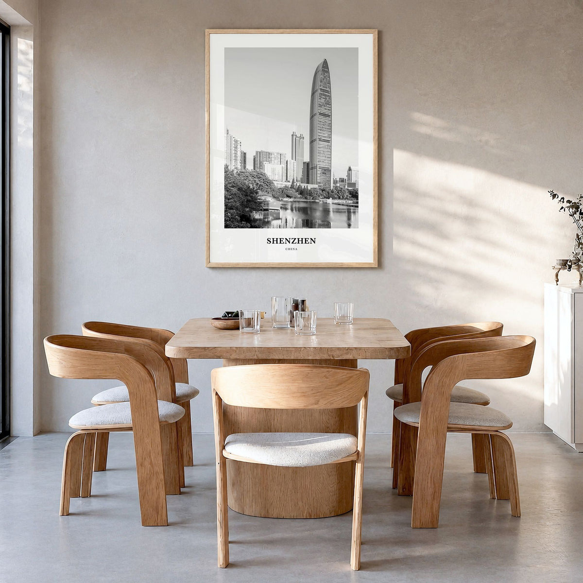 Shenzhen Classic Poster in a natural wood frame, hanging in a dining room
