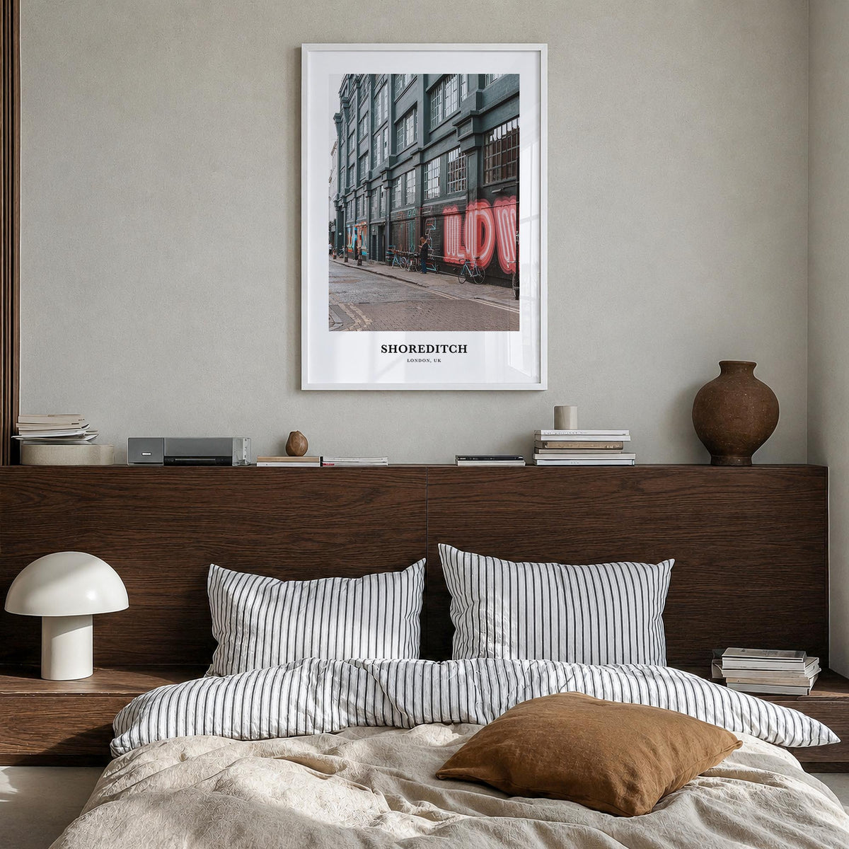 Shoreditch colorful classic poster of London, England – vertical wall art in white wood frame, hanging on wall