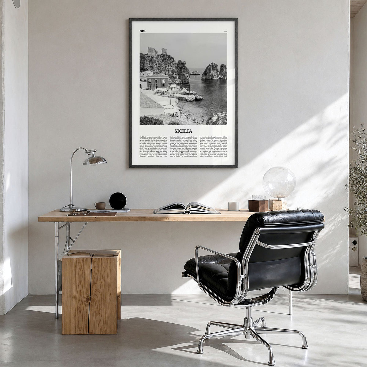Sicilia Newspaper Poster in a black wood frame, hanging in a bright home office