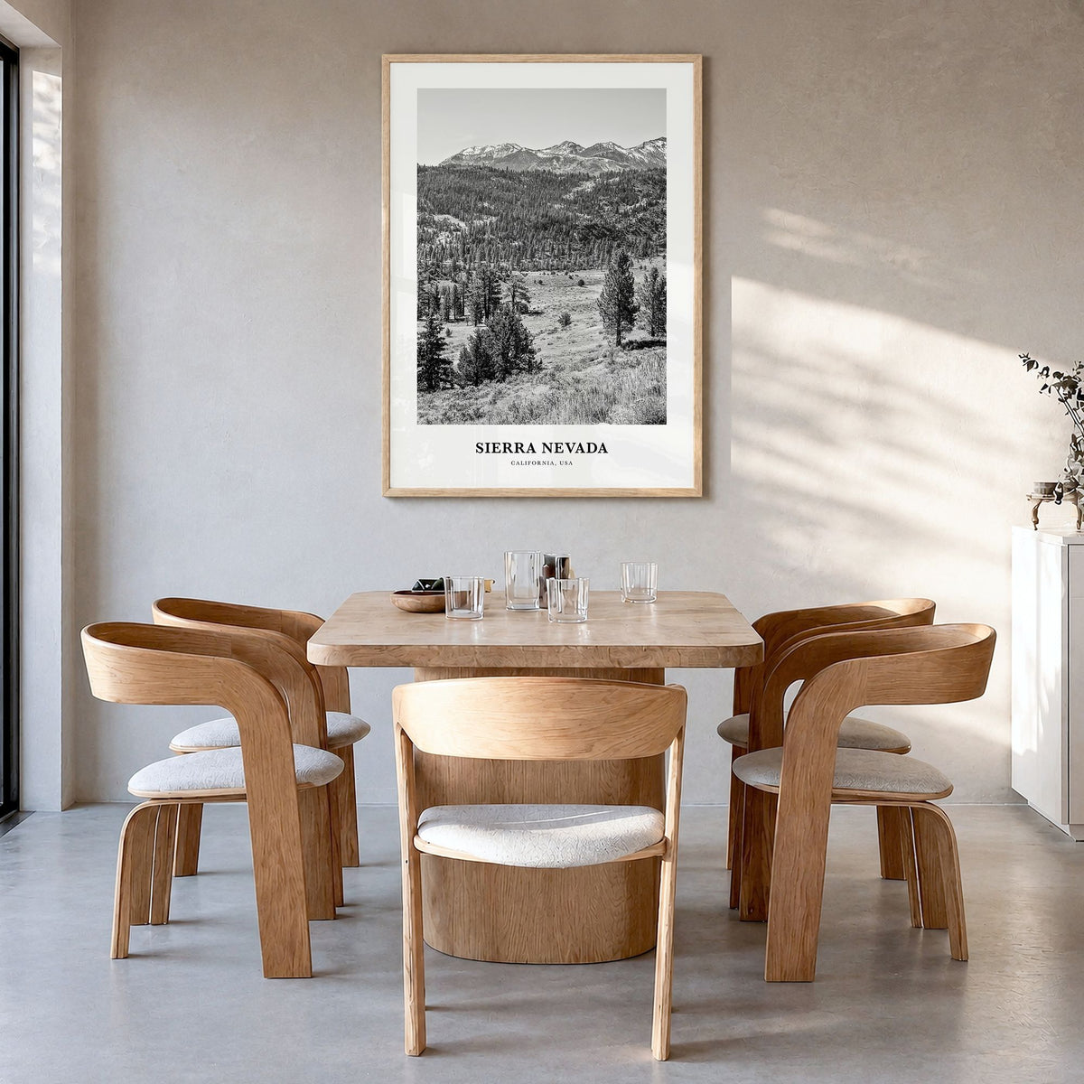 Sierra Nevada Classic Poster in a natural wood frame, hanging in a dining room