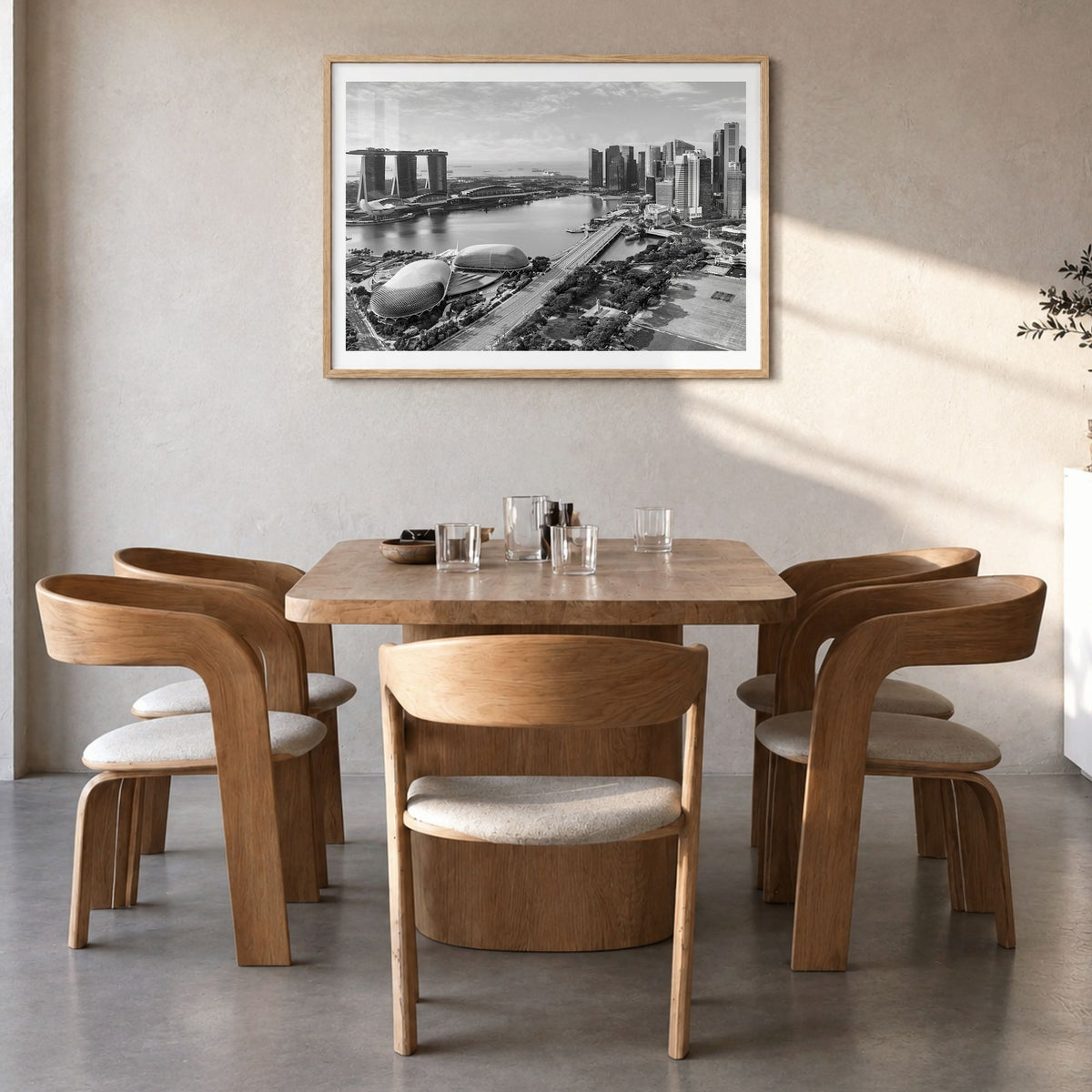 Singapore Photo Poster in a natural wood frame, hanging in a dining room, white border