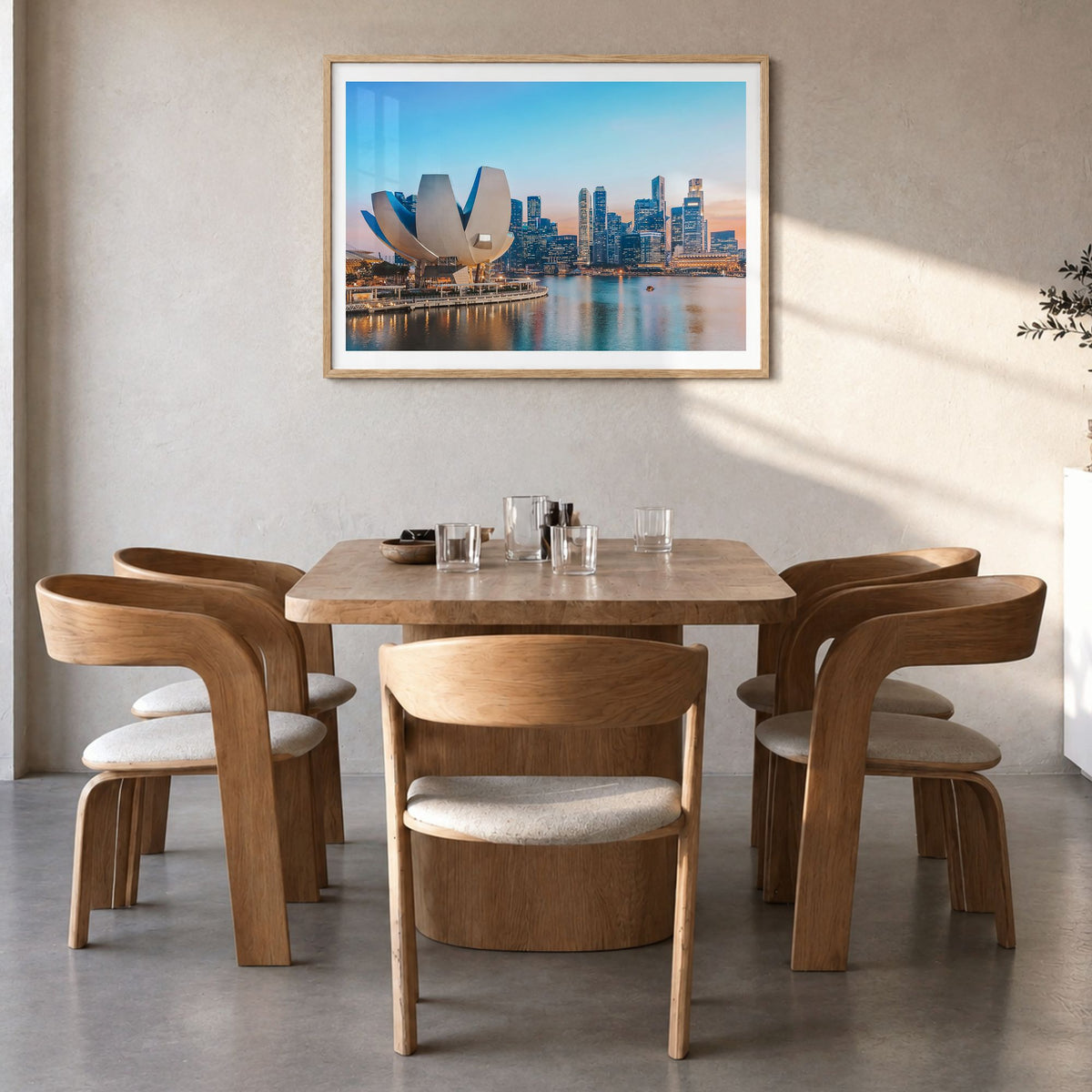 Singapore Photo Poster in a natural wood frame, hanging in a dining room, white border