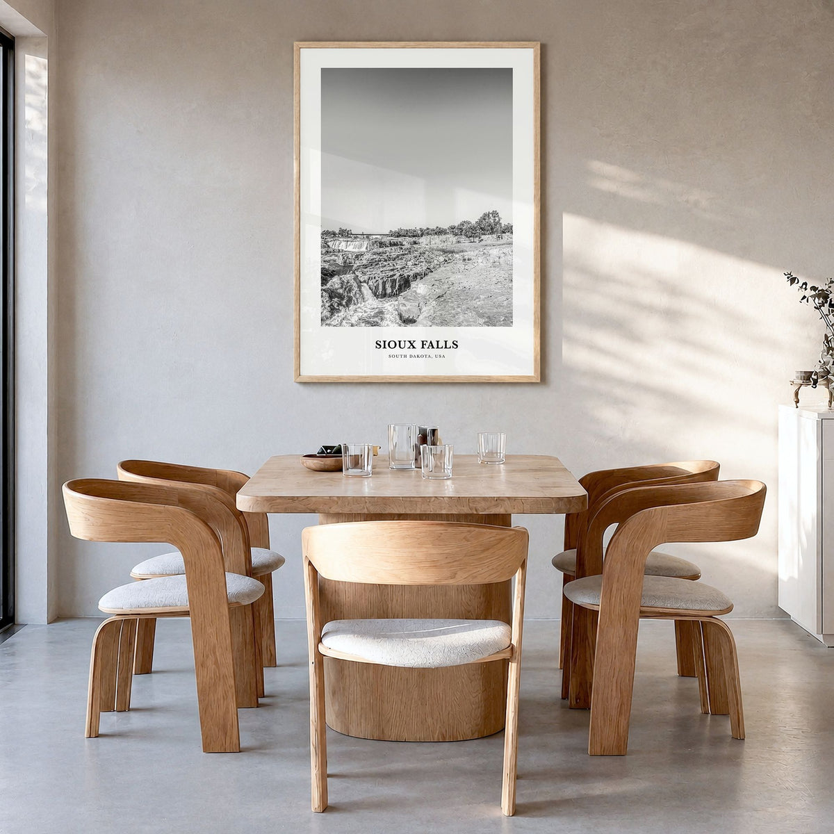 Sioux Falls Classic Poster in a natural wood frame, hanging in a dining room