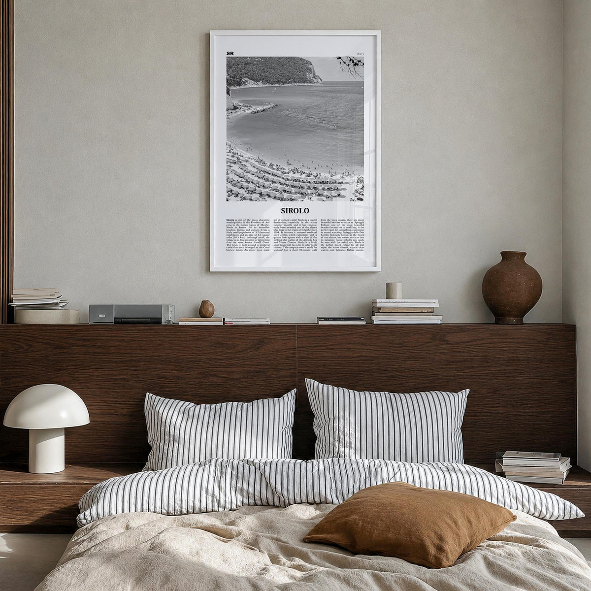 Sirolo black & white newspaper poster of Italy – vertical wall art in white wood frame, hanging on wall