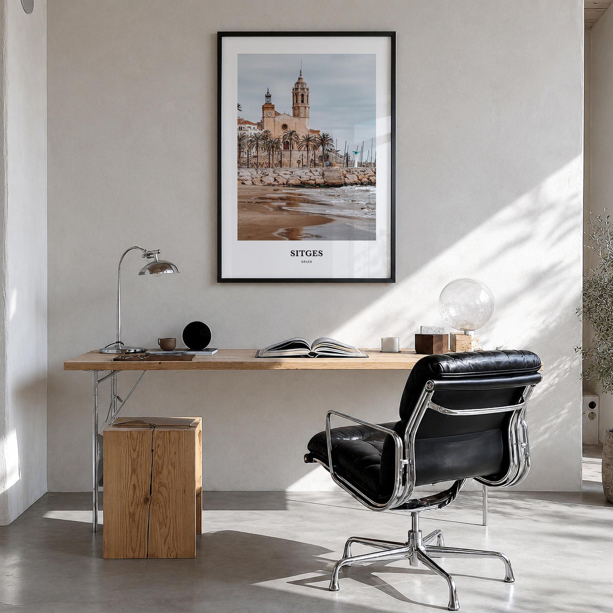 Sitges colorful classic poster of Spain – vertical wall art in black wood frame, hanging on wall