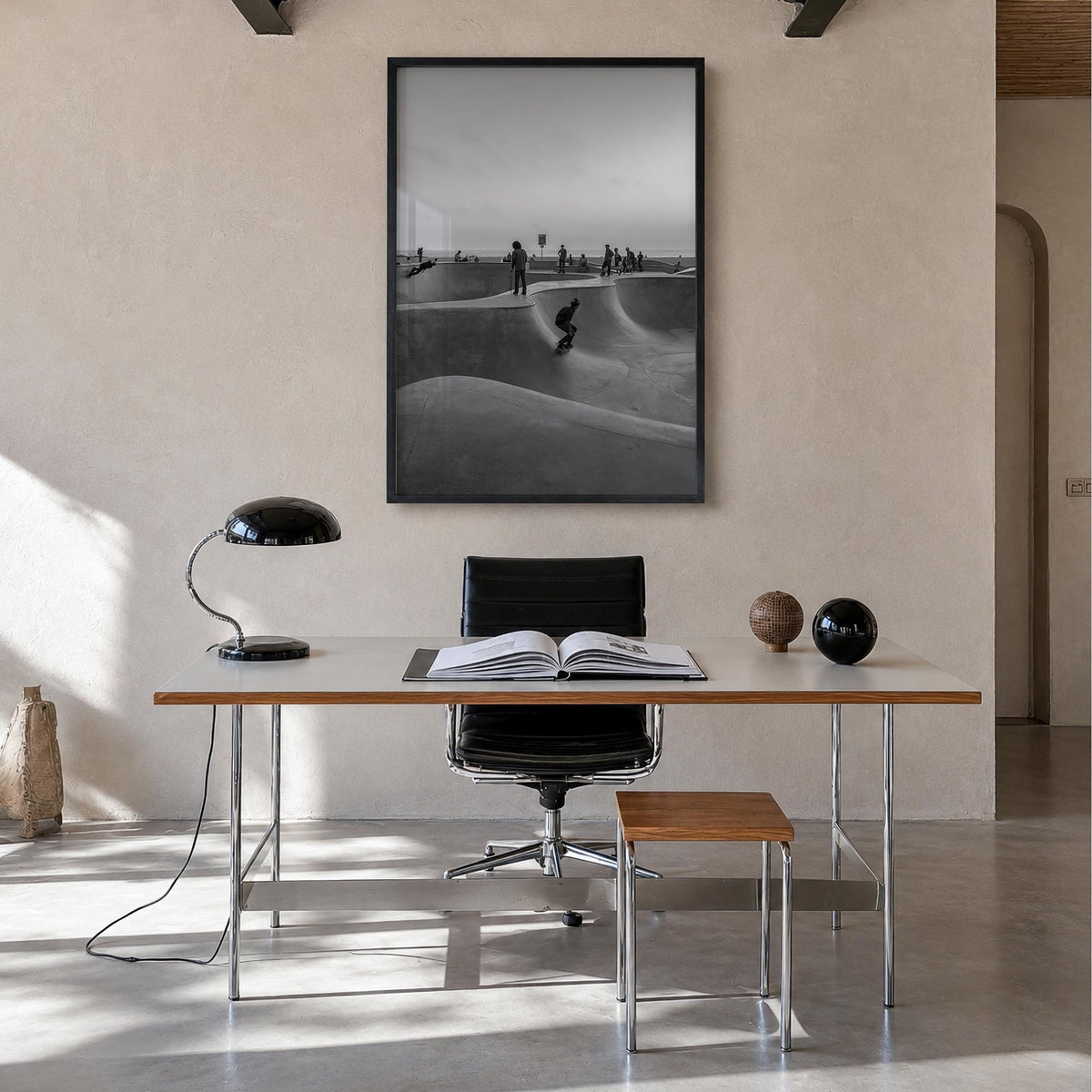 Skateboard no. 1 black & white photo poster – vertical wall art in black wood frame, hanging on wall