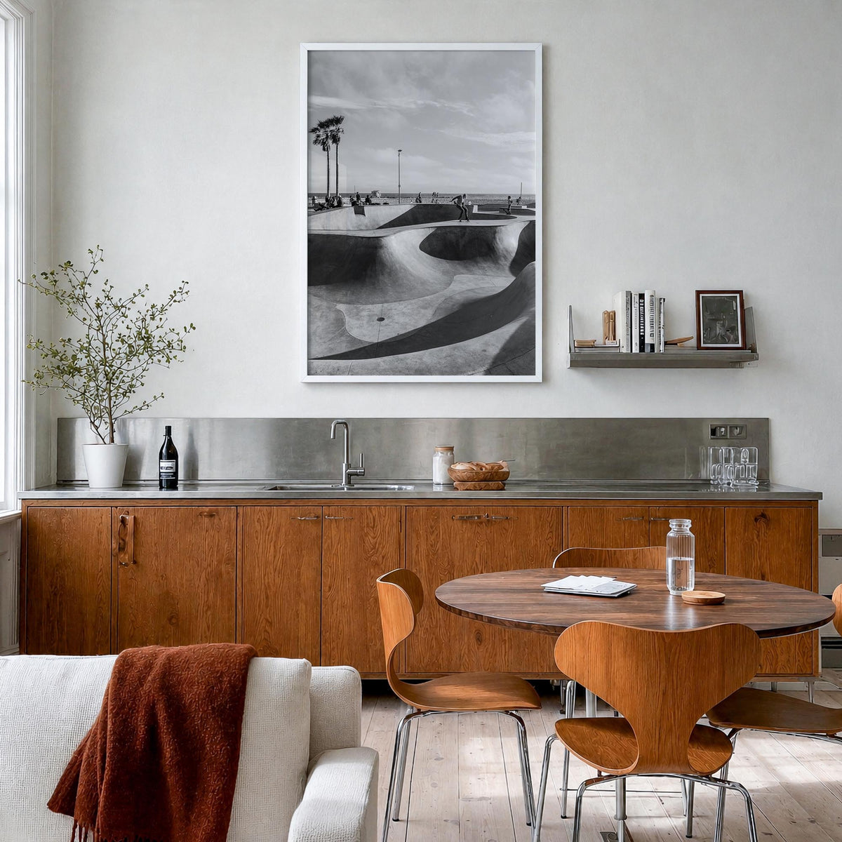 Skateboard no. 2 black & white photo poster – vertical wall art in white wood frame, hanging on wall