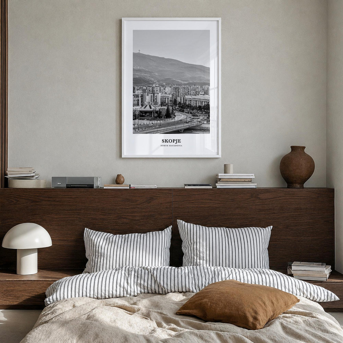 Skopje black & white classic poster of North Macedonia – vertical wall art in white wood frame, hanging on wall
