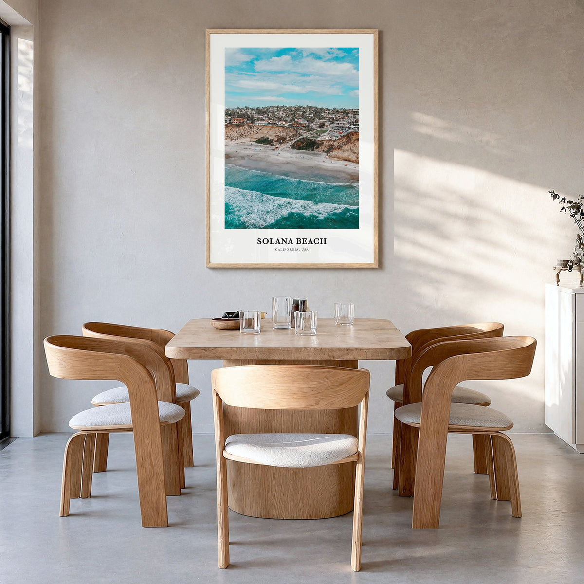 Solana Beach Classic Poster in a natural wood frame, hanging in a dining room