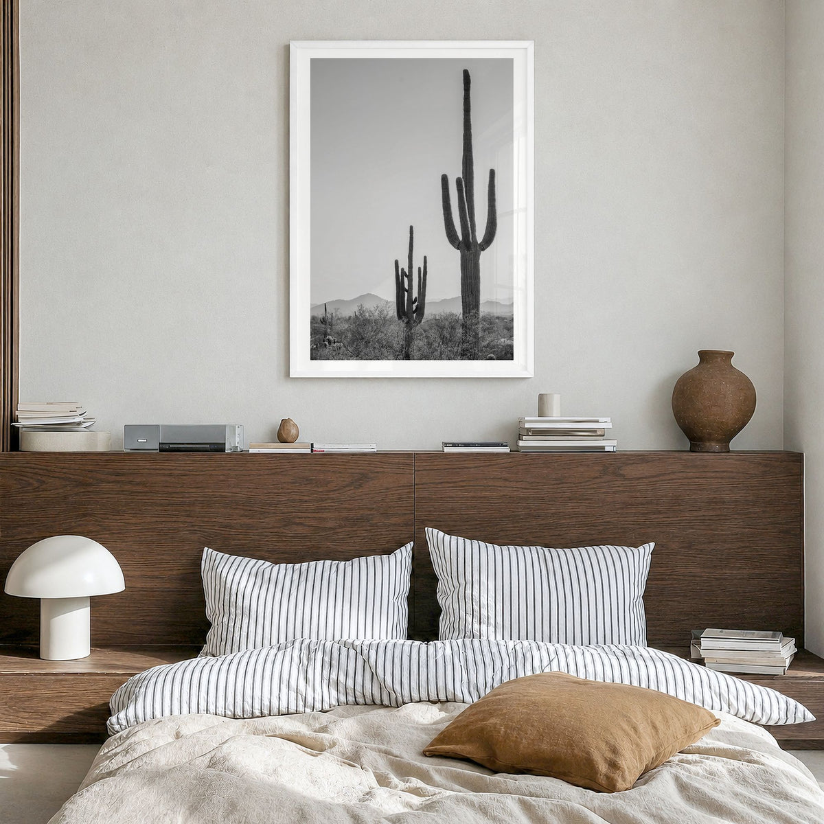 Sonora Photo Poster in a white wood frame, hanging in a bedroom, white border