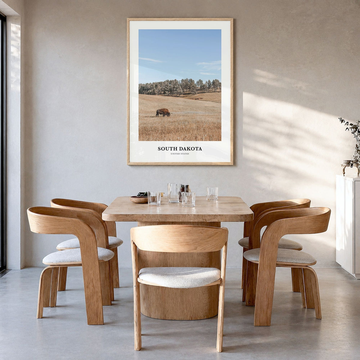 South Dakota Classic Poster in a natural wood frame, hanging in a dining room