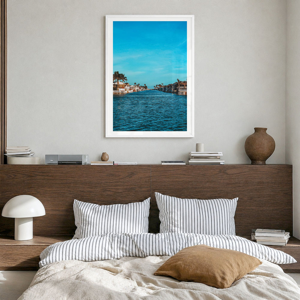 South Padre Island Photo Poster in a white wood frame, hanging in a bedroom, white border