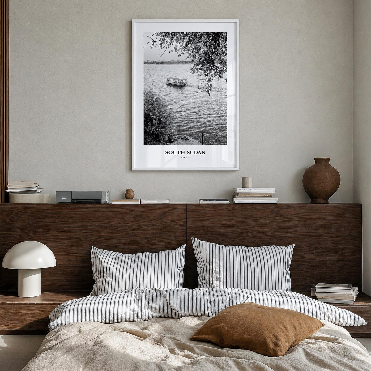South Sudan black & white classic poster of Africa – vertical wall art in white wood frame, hanging on wall