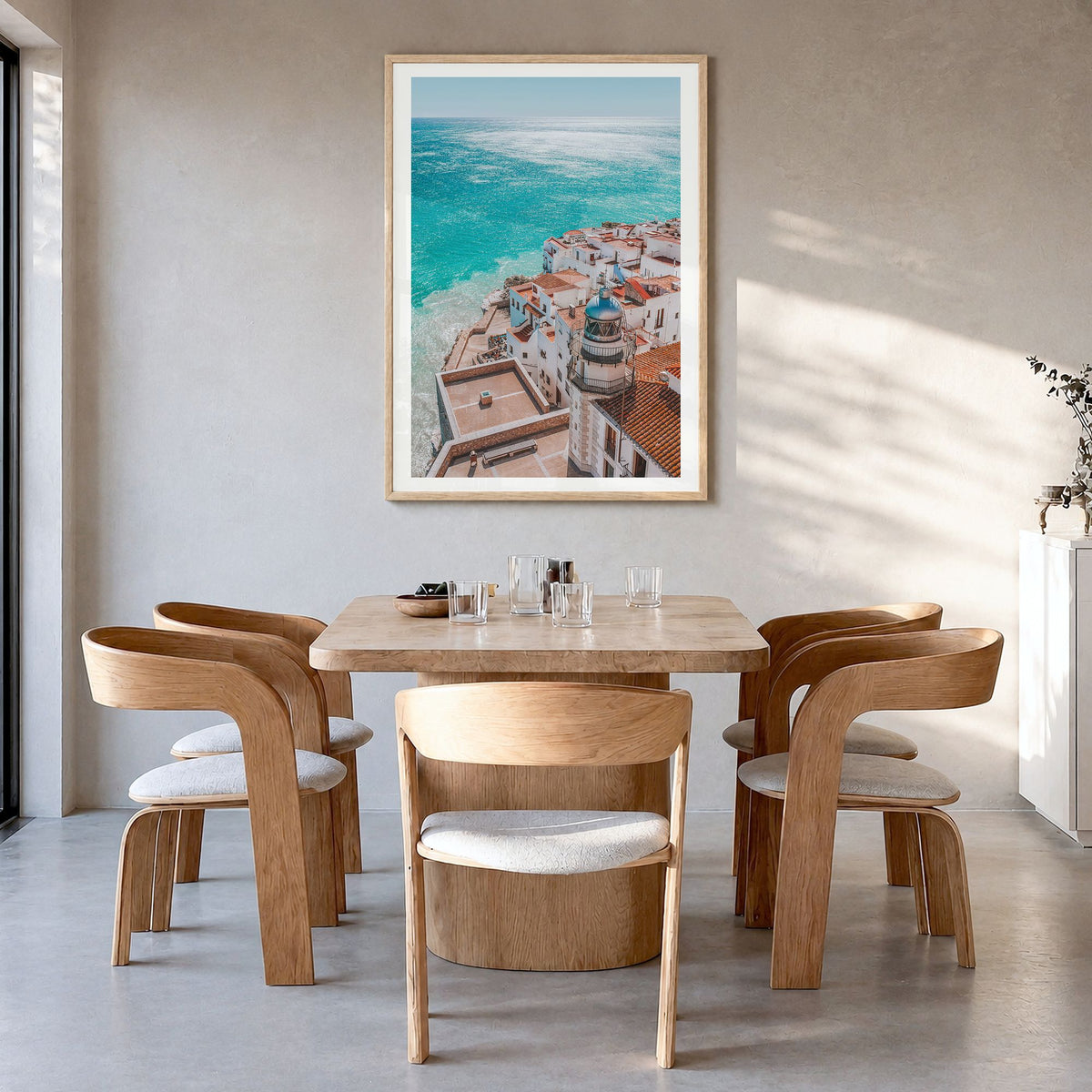 Spain Photo No 1 Poster in a natural wood frame, hanging in a dining room, white border