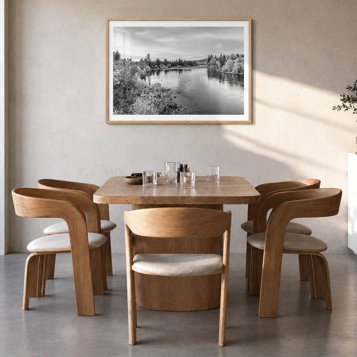 Spokane Photo Poster in a natural wood frame, hanging in a dining room, white border
