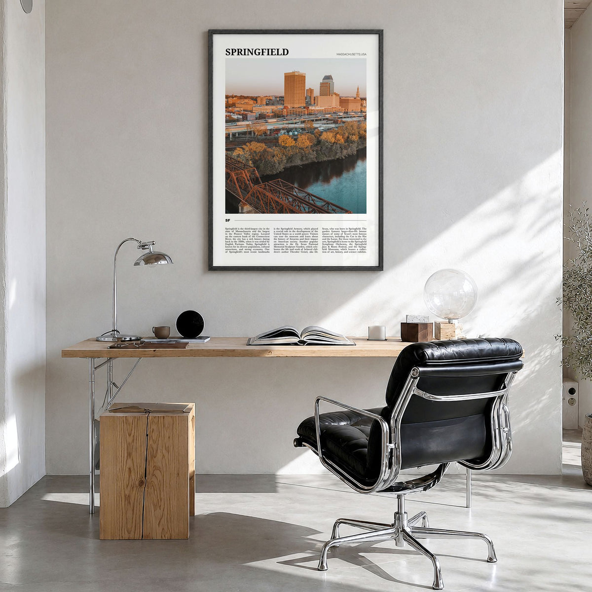Springfield, Massachusetts Travel Poster in a black wood frame, hanging in a bright home office