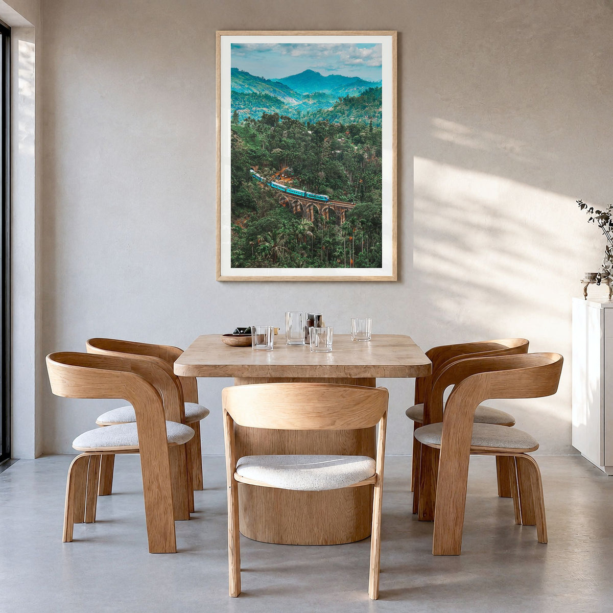 Sri Lanka Photo Poster in a natural wood frame, hanging in a dining room, white border