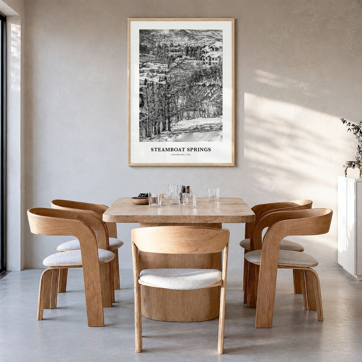 Steamboat Springs Classic Poster in a natural wood frame, hanging in a dining room