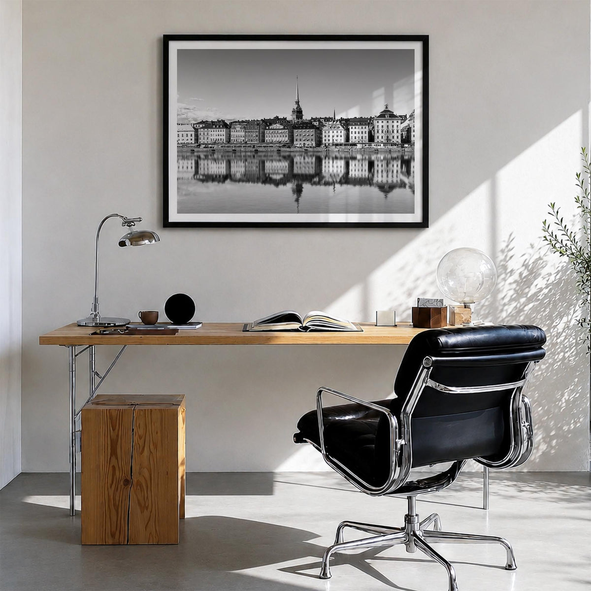 Stockholm black & white photo poster of Sweden – horizontal wall art in black wood frame with white border, hanging on wall