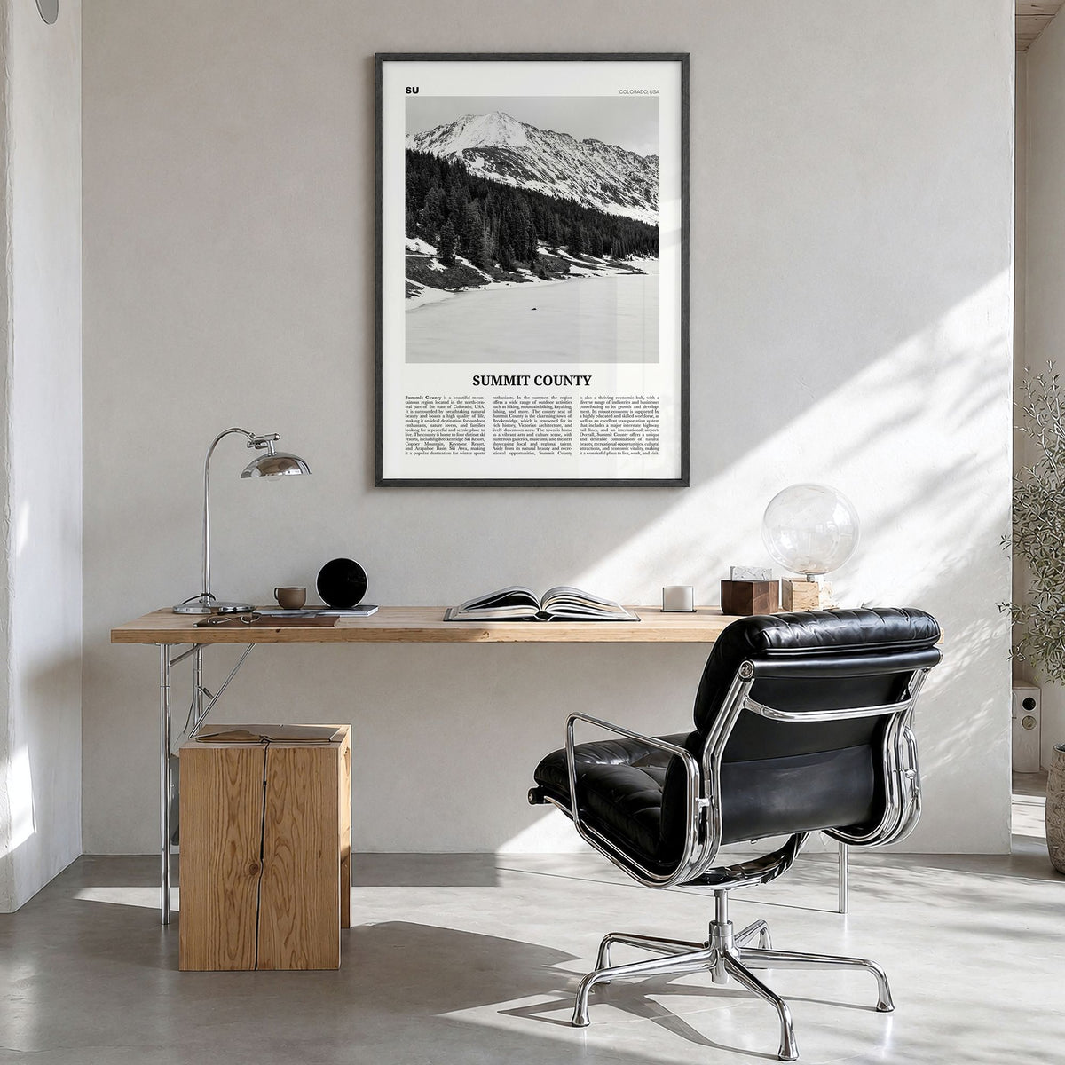Summit County Newspaper Poster in a black wood frame, hanging in a bright home office
