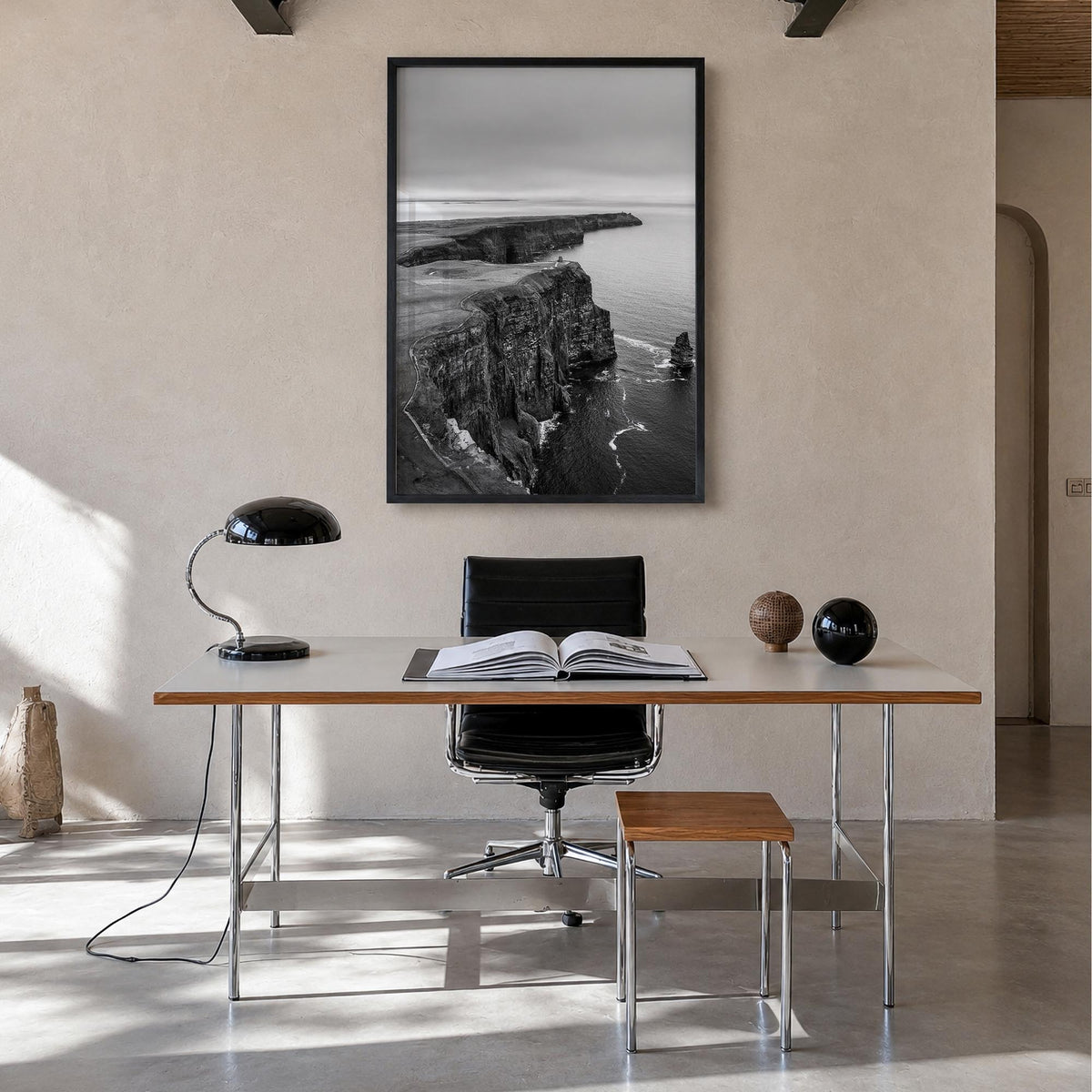 Sunset Cliffs black & white photo poster of San Diego, California – vertical wall art in black wood frame, hanging on wall