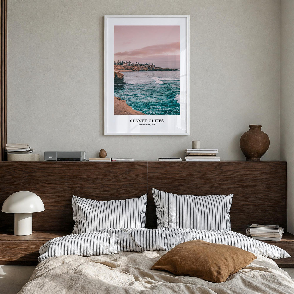 Sunset Cliffs colorful classic poster of San Diego, California – vertical wall art in white wood frame, hanging on wall