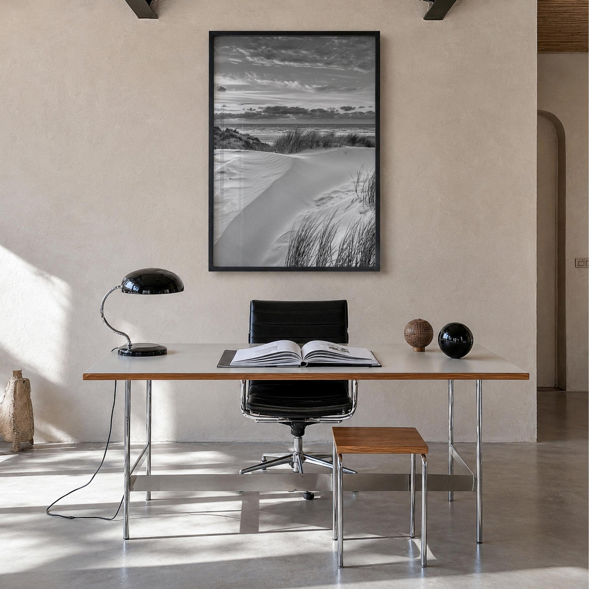 Sunset Coast black & white photo poster – vertical wall art in black wood frame, hanging on wall