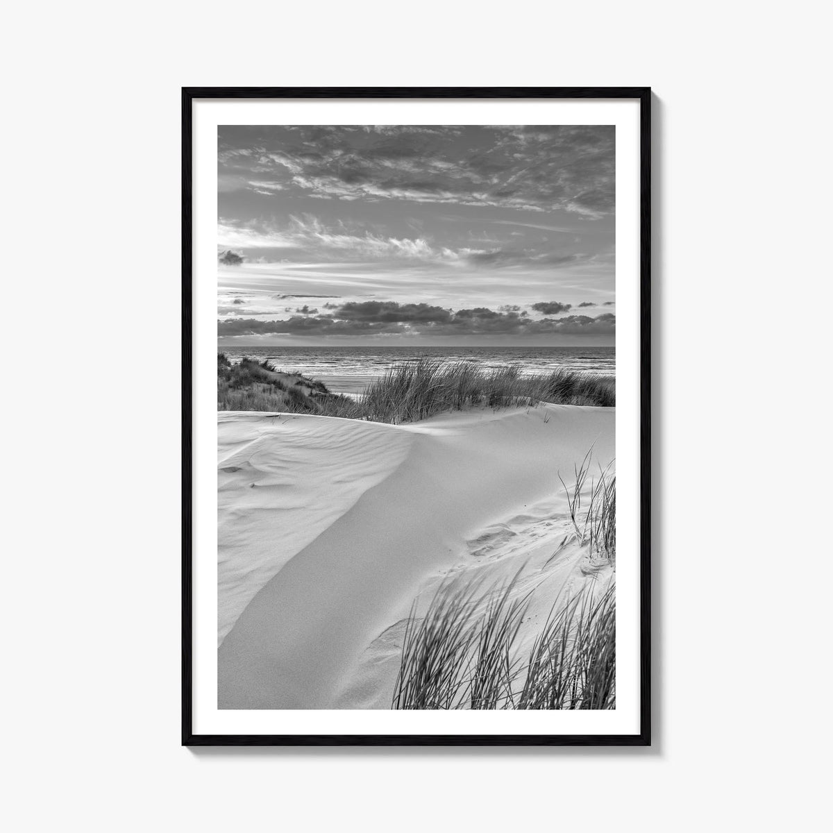 Sunset Coast black & white photo poster – vertical wall art, unframed print shown in interior mockup