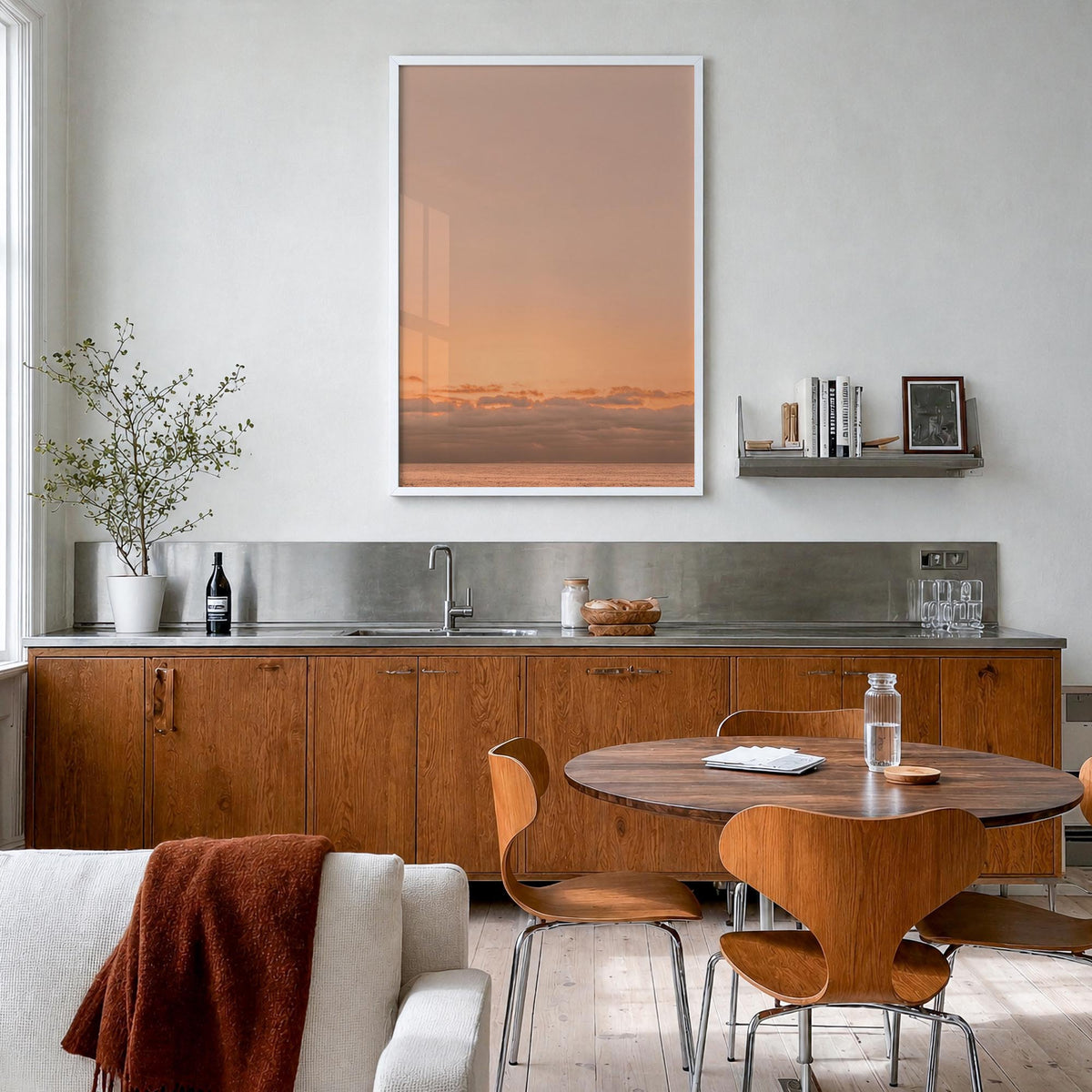 Sunset Ocean no. 1 colorful photo poster – vertical wall art in white wood frame, hanging on wall