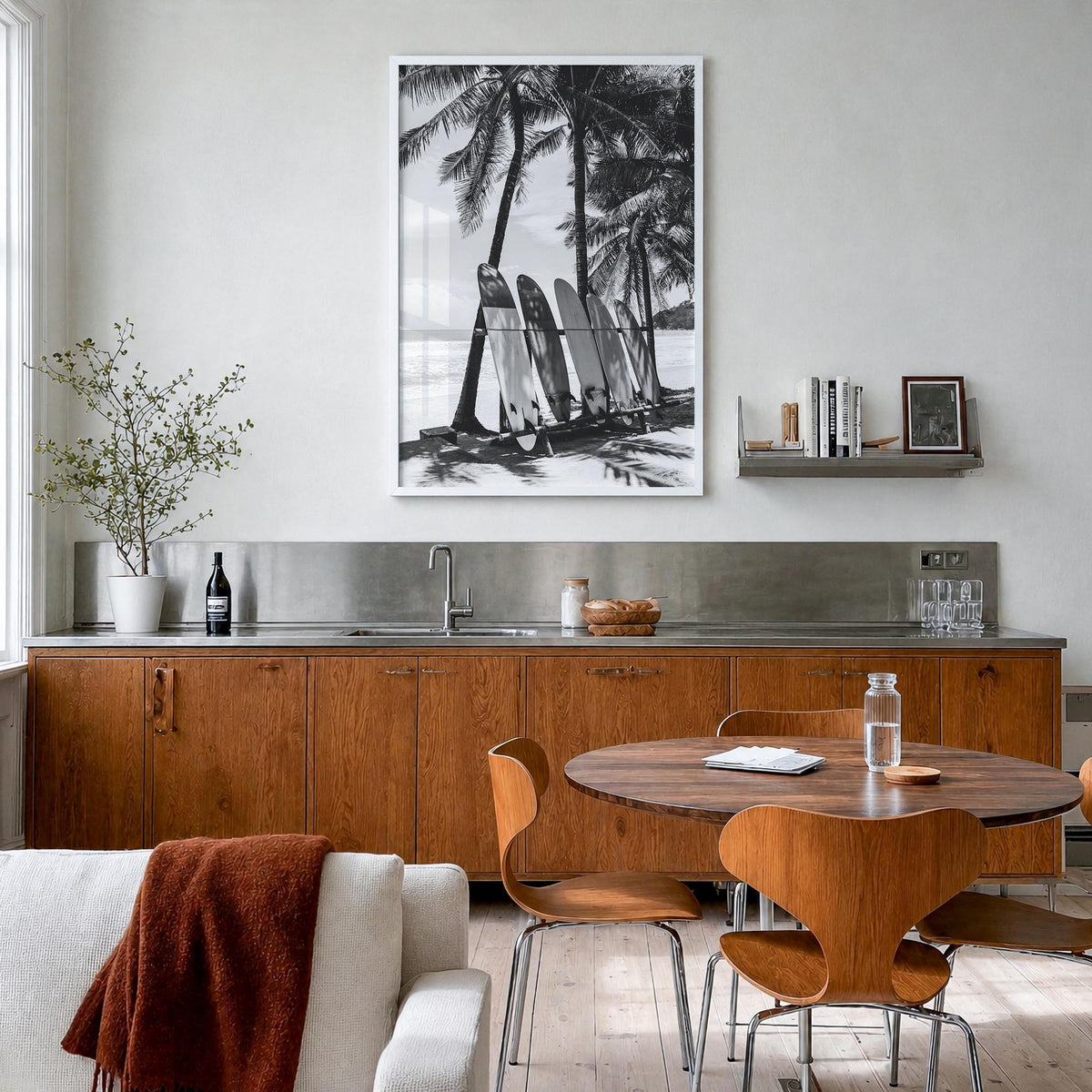 Surfboard no. 2 black & white photo poster – vertical wall art in white wood frame, hanging on wall