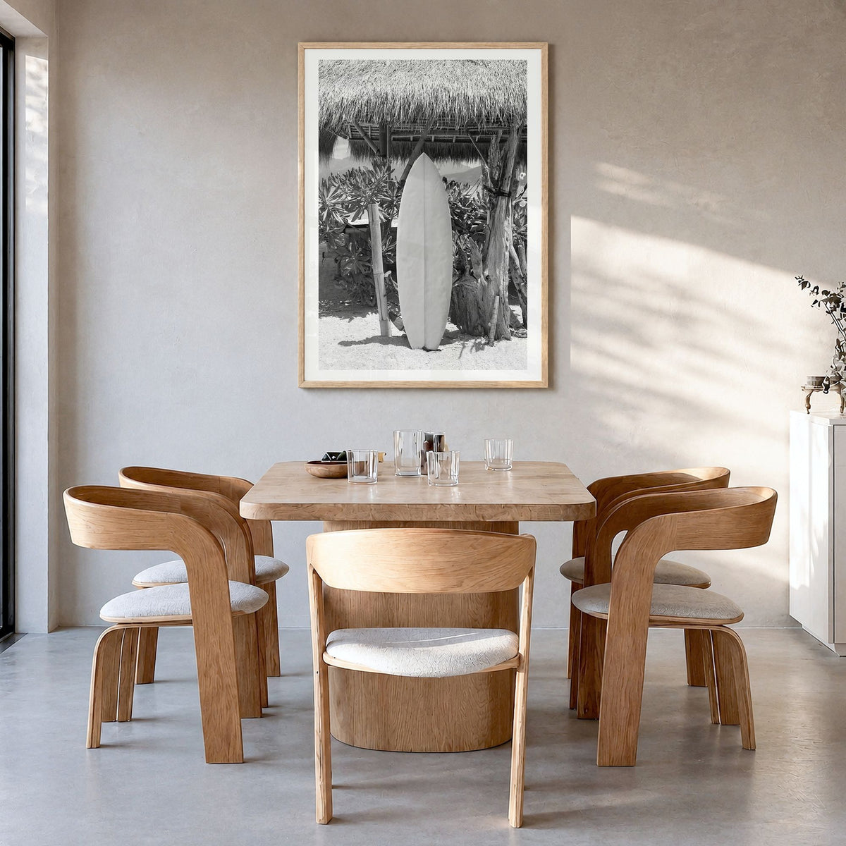 Surfboard Photo No 1 Poster in a natural wood frame, hanging in a dining room, white border