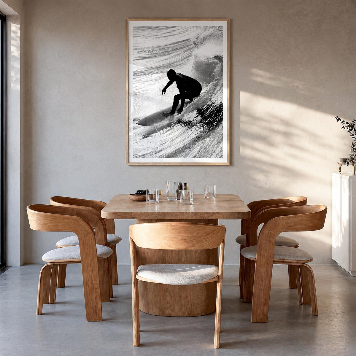 Surfer no. 5 black & white photo poster – vertical wall art in natural wood frame with white border, hanging on wall