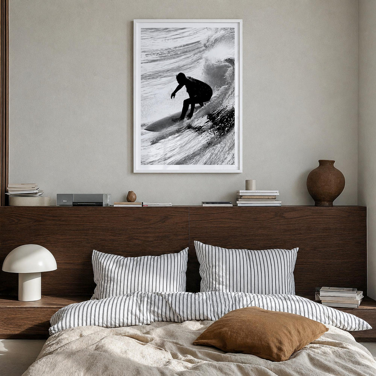 Surfer no. 5 black & white photo poster – vertical wall art in white wood frame with white border, hanging on wall