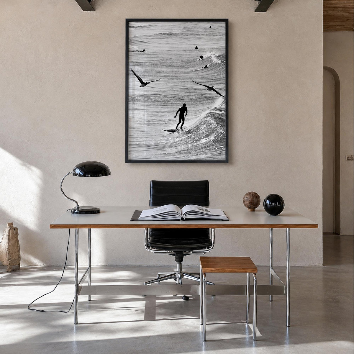 Surfing no. 1 black & white photo poster – vertical wall art in black wood frame, hanging on wall