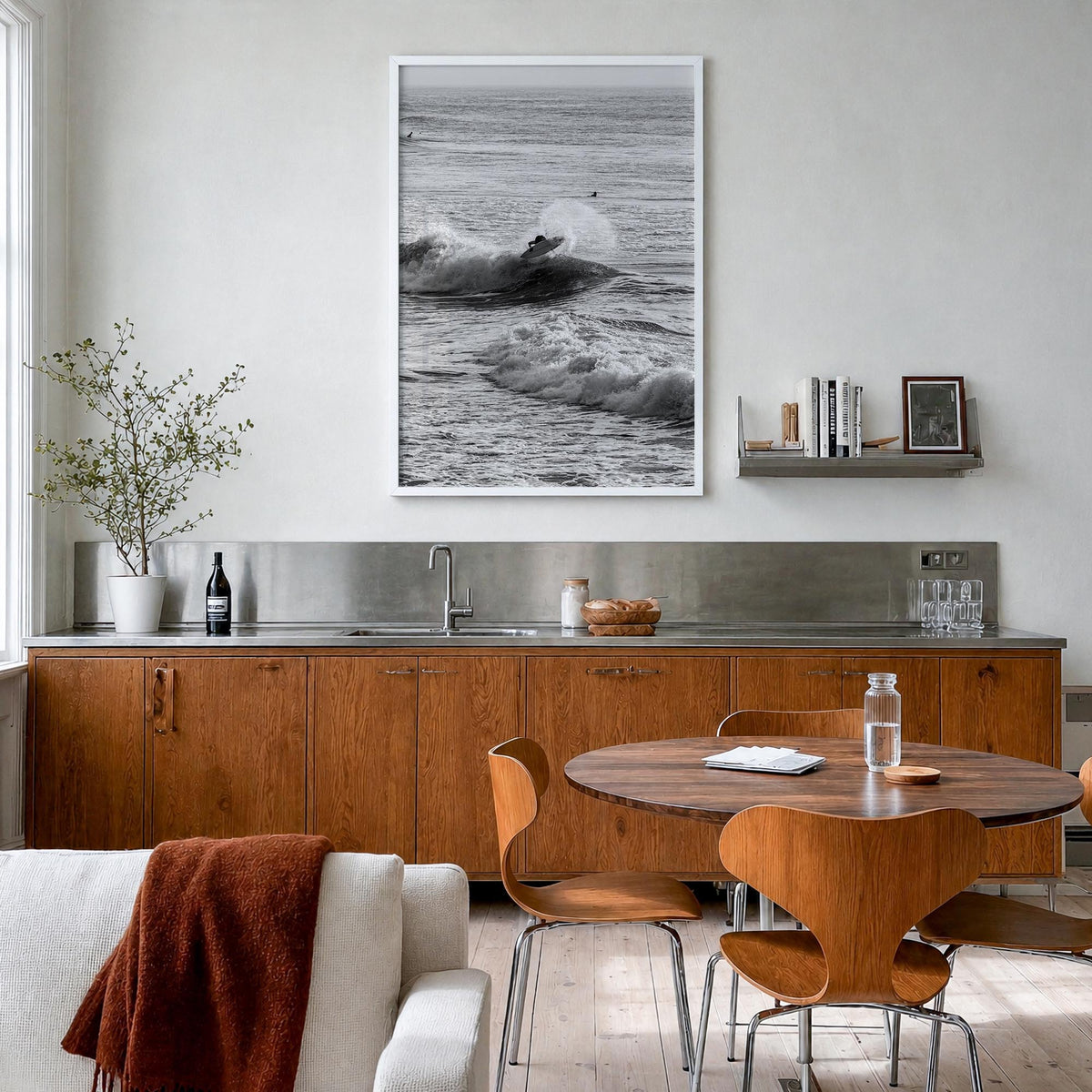 Surfing no. 3 black & white photo poster – vertical wall art in white wood frame, hanging on wall