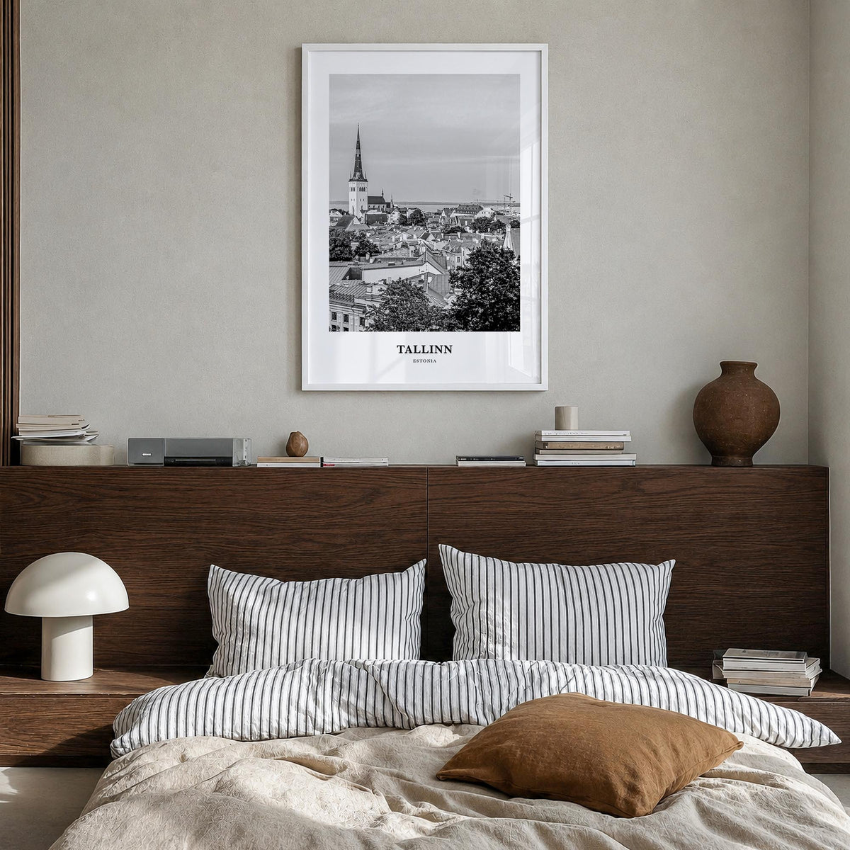 Tallinn black & white classic poster of Estonia – vertical wall art in white wood frame, hanging on wall