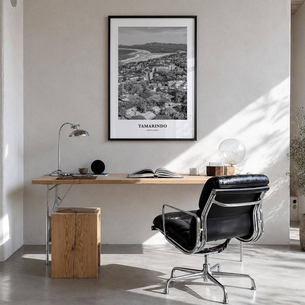 Tamarindo black & white classic poster of Costa Rica – vertical wall art in black wood frame, hanging on wall